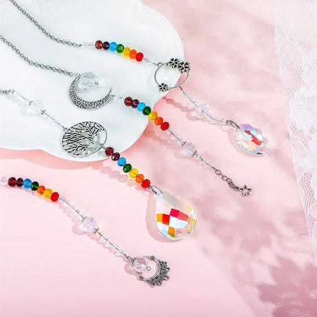 Decorative car hangers with colorful beads and silver charms on a pink background