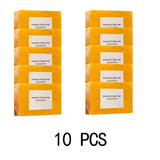 Two stacks of yellow boxes labeled 'turmeric & kojic soap' with a total of 10 pieces.
