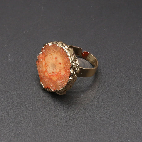 Ring with a natural stone design on a dark gray background
