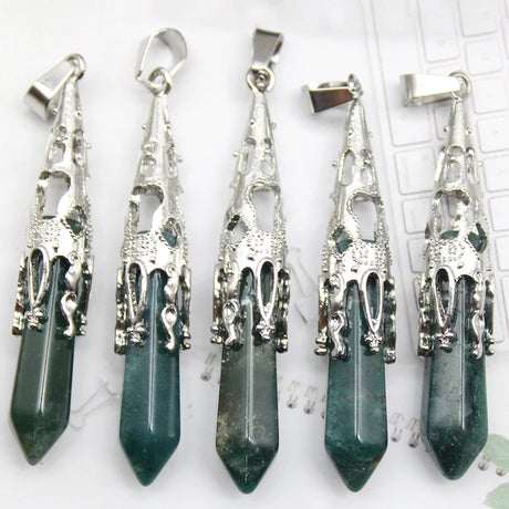 Five green crystal pendants with silver tops on a white background