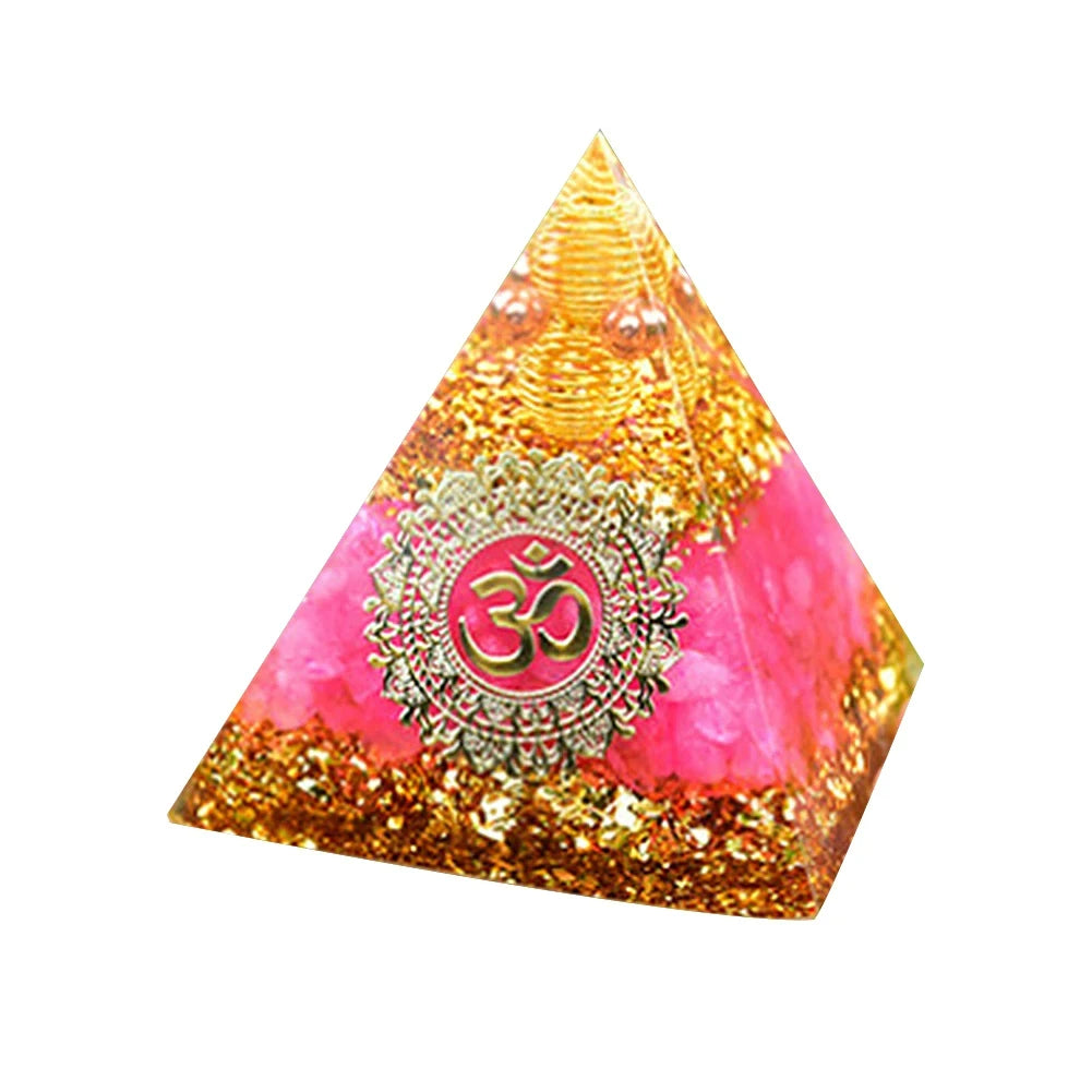 Pyramid-shaped object with a pink center and gold accents on a white background