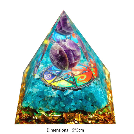 Pyramid-shaped crystal with amethyst stones and colorful design on a white background