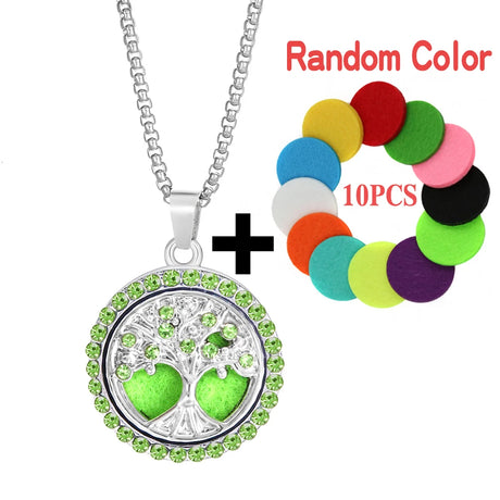 Tree of Life pendant necklace with green stones and a bracelet with colorful discs on a white background.