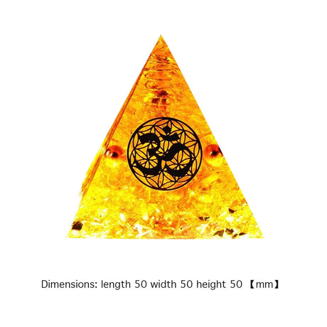 Triangular amber-colored crystal with a black symbol in the center on a white background