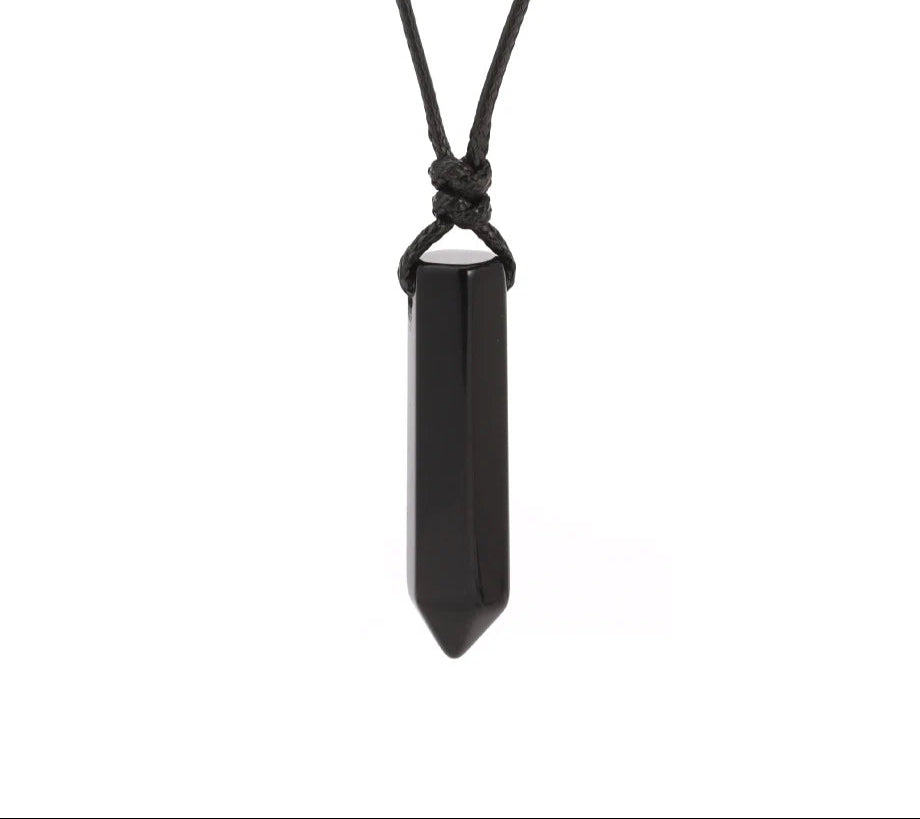 Black crystal pendant necklace on a white background with Czia Jewels logo.