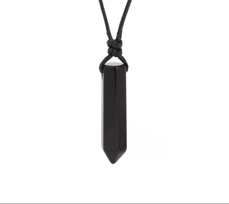Black crystal pendant necklace on a white background with Czia Jewels logo.