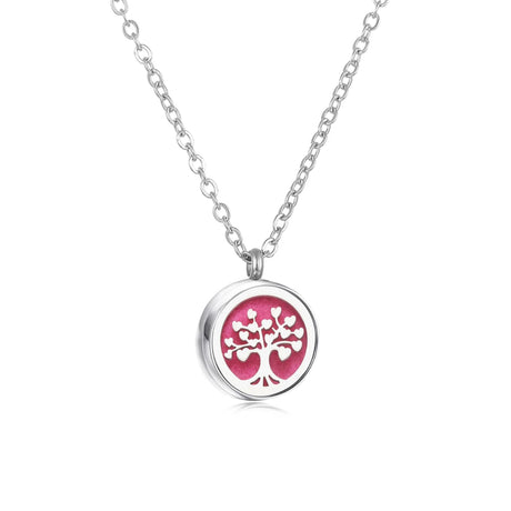 Necklace with a pink tree of life pendant on a white background