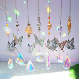 Decorative hanging elements with butterflies and crystal-like shapes on a light background