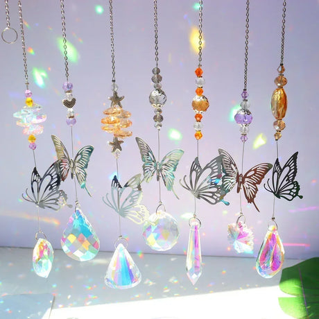 Decorative hanging elements with butterflies and crystal-like shapes on a light background
