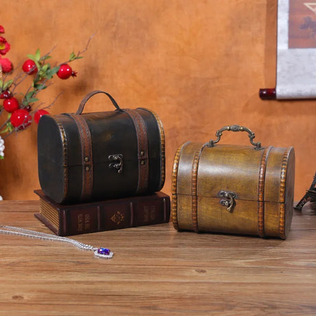 Two wooden treasure chests on a wooden surface with a decorative background.
