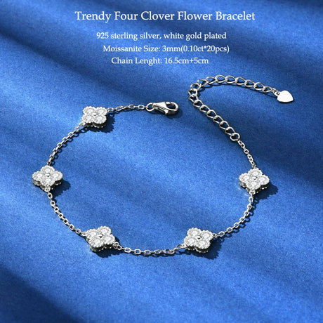 Silver bracelet with clover flowers on a blue background