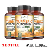 Three bottles of Turmeric Curcumin supplement with Bioperine on a white background
