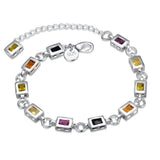 Silver bracelet with colorful gemstones on a white background