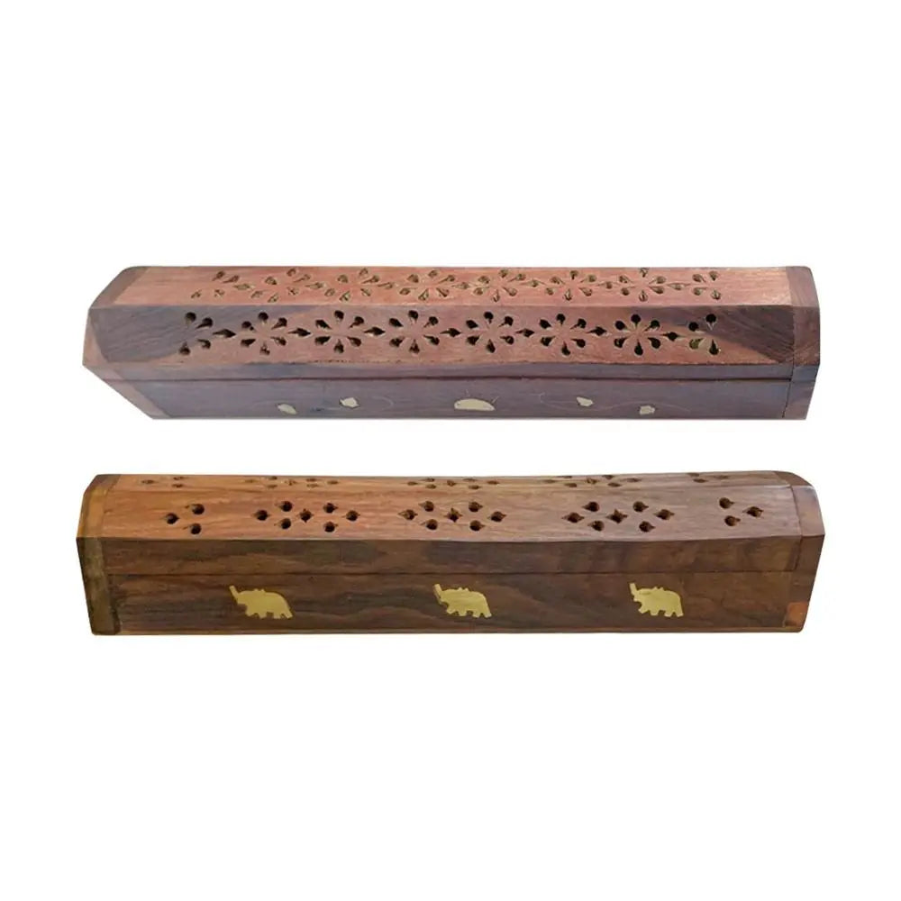 Two wooden incense holders with decorative patterns on a white background
