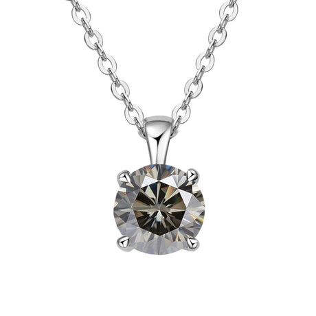 Silver necklace with a round diamond pendant on a white background