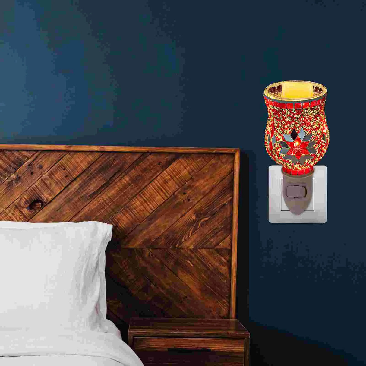 Decorative night light on a wall next to a bed with wooden headboard