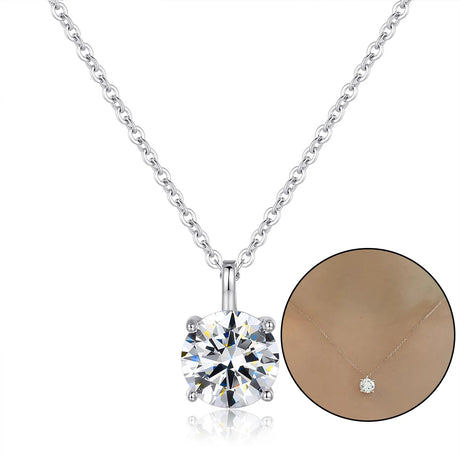 Silver necklace with a large diamond pendant on a white background