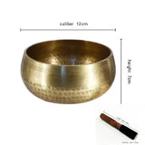 Brass singing bowl with dimensions on a white background