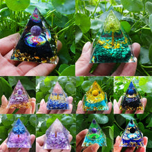 Collage of triangular crystal pyramids held in hands against a green leafy background