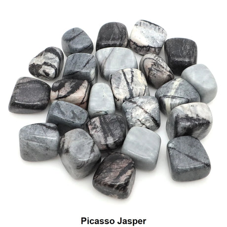 Collection of Picasso Jasper stones on a white background