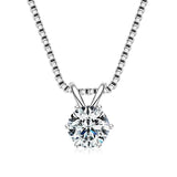 Silver necklace with a round diamond pendant on a white background