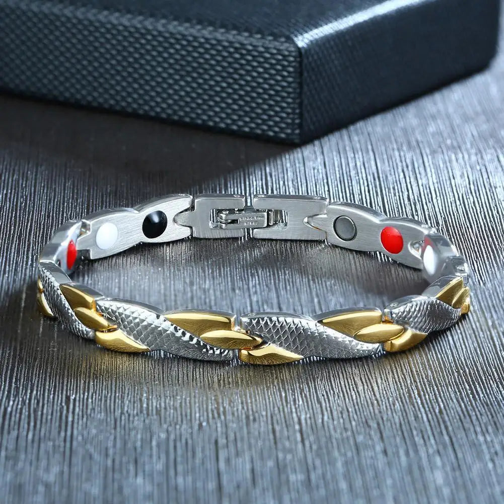 Bracelet with metal and gold braided design on a textured surface