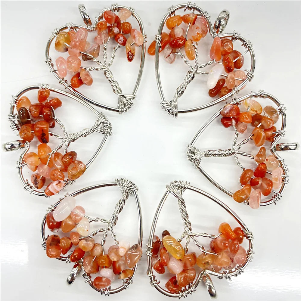 Set of heart-shaped stone pendants with silver wire frames on a white background
