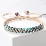 Beaded choker necklace with blue stones on a white surface