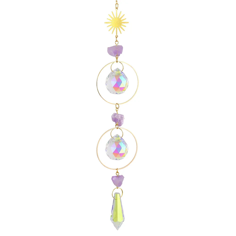 Decorative hanging ornament with crystals and a sun-like top on a white background