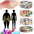 Colorful gemstone rings displayed with a hand holding a small gemstone, black silhouettes of a man and woman, and various gemstones.