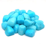 Turquoise stones on a white background