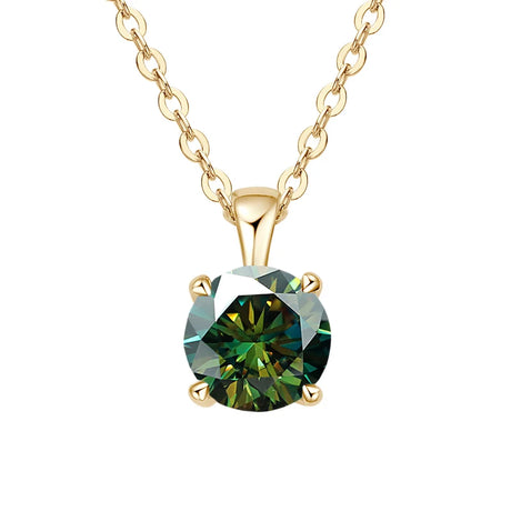 Gold necklace with a green gemstone pendant on a white background