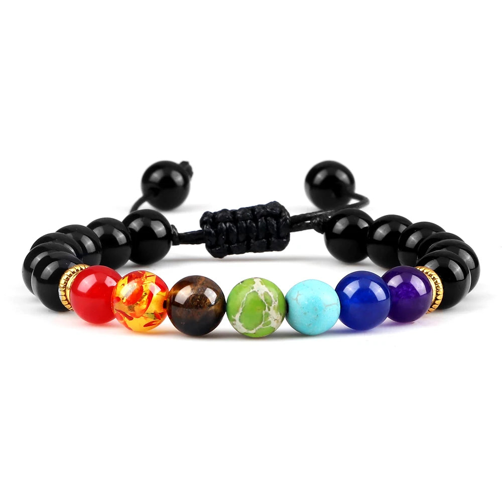 Multicolored beaded bracelet with black cord on a white background