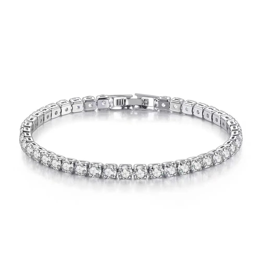 Silver bracelet with clear gemstones on a white background