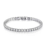 Silver bracelet with clear gemstones on a white background