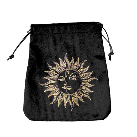 Black drawstring bag with a gold sun and face design on a white background