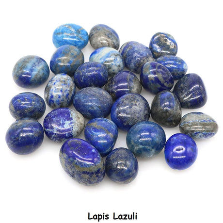 Collection of lapis lazuli stones on a white background