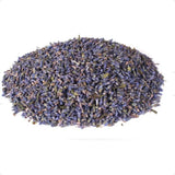 Pile of dried lavender flowers on a white background