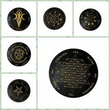 Set of black and gold circular designs with various symbols and text on a light green grid background.