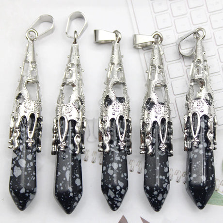 Five black and silver pendant necklaces on a white background