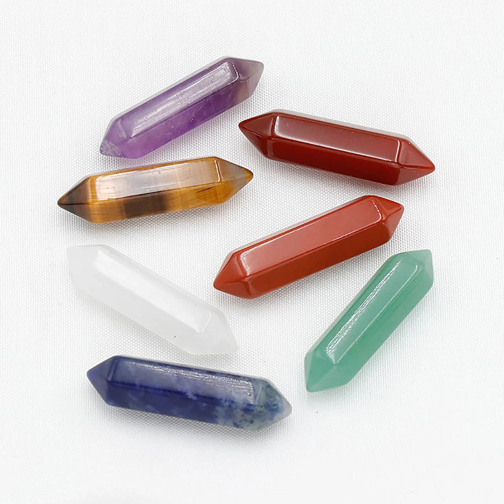 Set of colorful crystal points on a white background