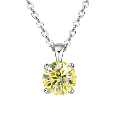 Yellow gemstone pendant on a silver chain against a white background