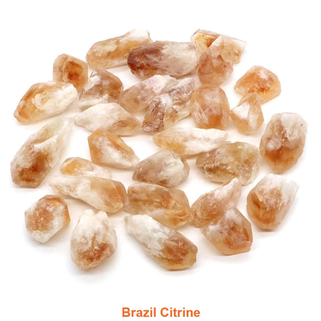 Collection of Brazil Citrine stones on a white background