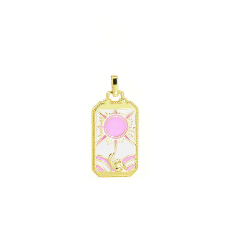 Gold pendant with pink gemstone on a white background