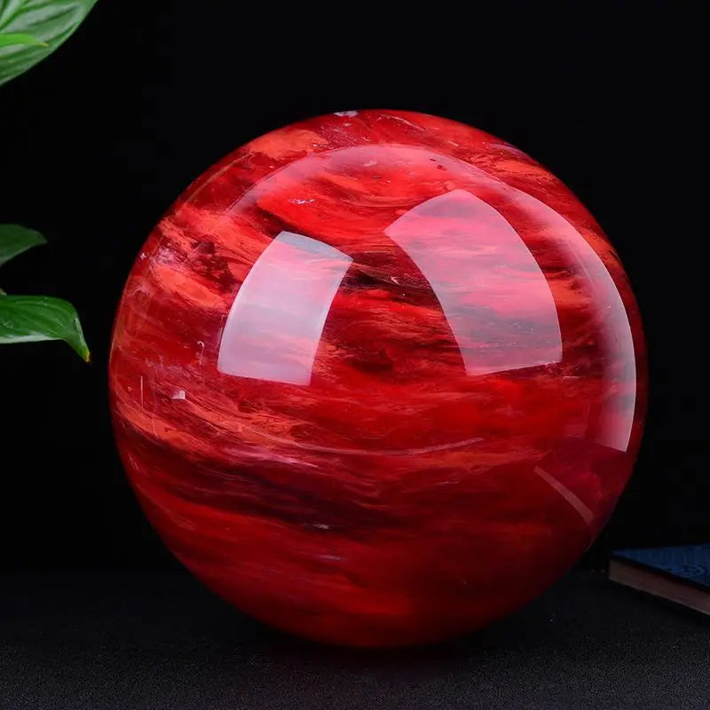 Red crystal ball with a dark background