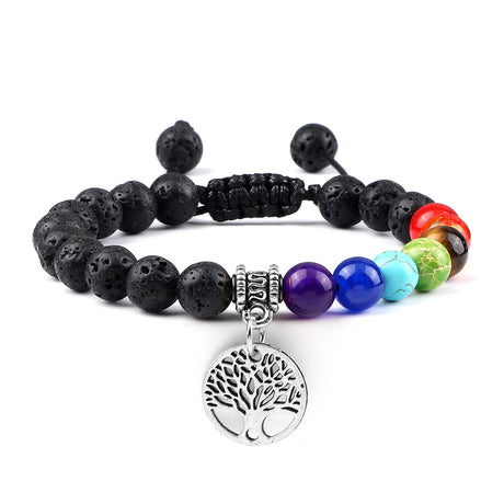 Multicolored beaded bracelet with a tree of life charm on a white background