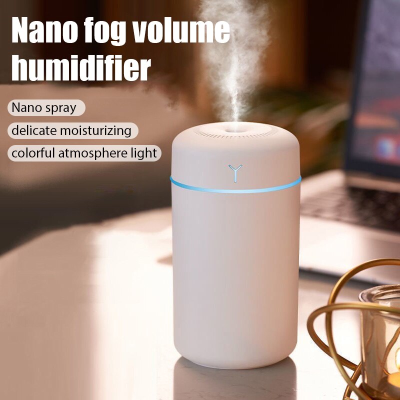 Nano fog volume humidifier on a table with text describing its features.