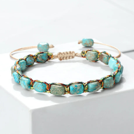 Turquoise beaded bracelet on a white background