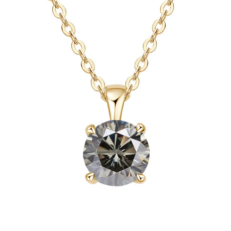 Gold necklace with a round diamond pendant on a white background