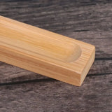 Wooden handle on a wooden surface